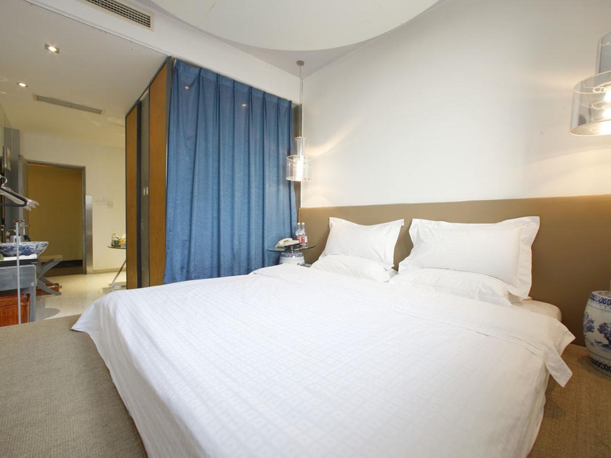 China Community Art Habitat Hotel Qingdao Værelse billede