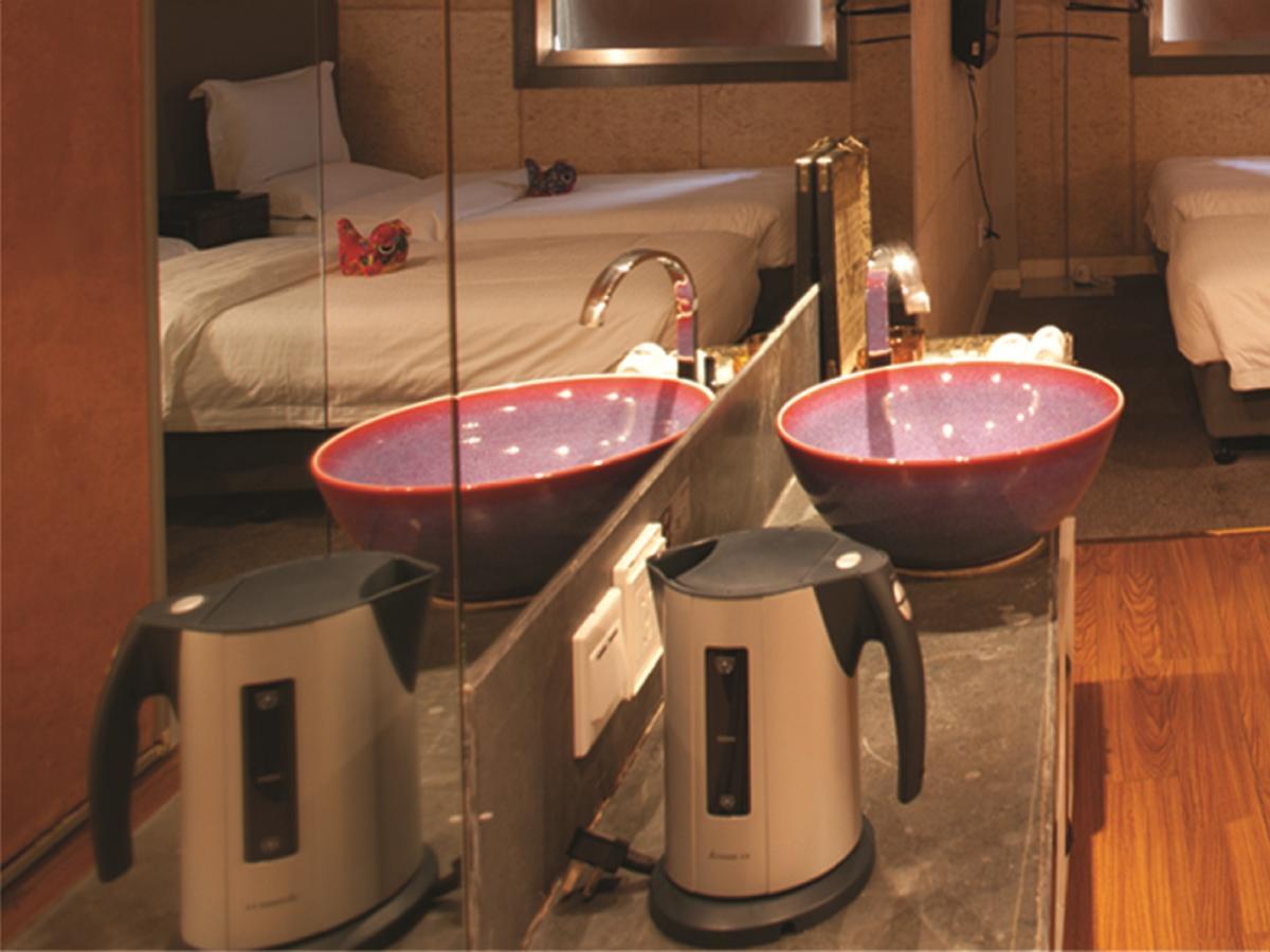 China Community Art Habitat Hotel Qingdao Værelse billede